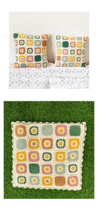Close-up detail of crochet granny square cushion cover with bohemian floral pattern