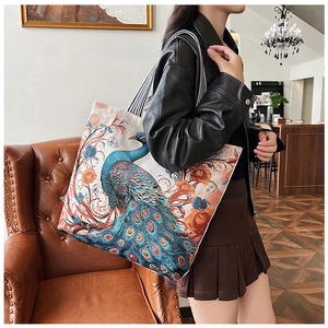 Detailed embroidery of ethnic 3D butterfly pattern on a large canvas tote bag