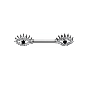 Surgical steel nipple ring with sparkling crystal eyes and black pupils on white backdrop