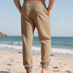 Men's khaki waffle knit joggers with elastic waist and back pocket for casual beach wear
