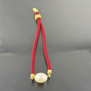 Handmade red Milan cord bracelet with white pearl and gold metal bead accents