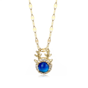 Golden reindeer necklace with blue temperature sensitive stone and zircon accents