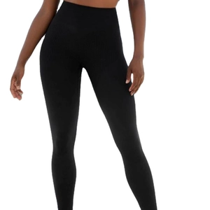 High waist seamless black yoga leggings with tummy control and breathable knit texture