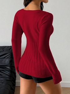 Detailed back view of a slim-fit red knit sweater with vertical ribbed texture