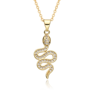 Macro detail of gold-plated snake pendant with micro-pave crystals on white backdrop