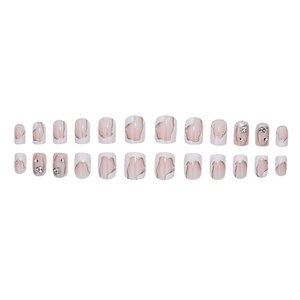 Unghie finte corte stile francese rosa nude con motivi marmorizzati e strass lucidi