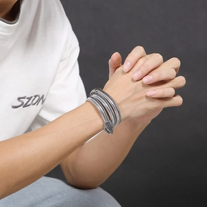 Three-layer silver snake-shaped stainless steel coiled bracelet with scale texture