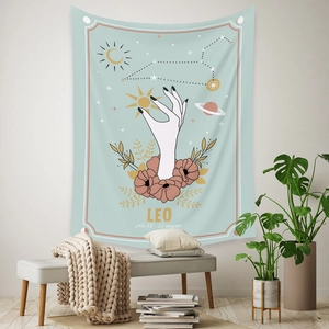 Detailed view of Leo zodiac tapestry with floral art and celestial icons in a cozy room