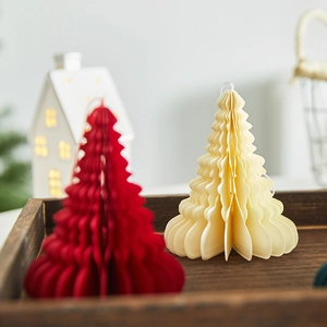 Foldable beige and red honeycomb paper Christmas trees for festive tabletop decoration