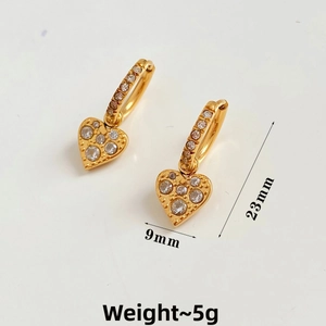 Detailed view of 23mm gold heart earrings with zircon inlay and 9mm width dimensions