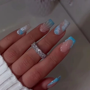 Blue and white marble press-on nails with 3D relief and silver baguette cz ring