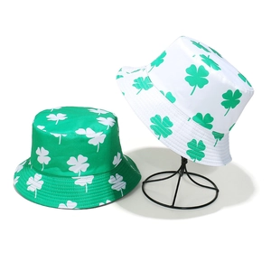 Reversible St. Patrick's Day bucket hat featuring green and white shamrock prints