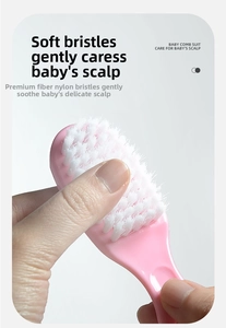 Macro shot showing soft nylon bristles on a pink baby hair brush for scalp care