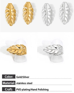 Macro view of leaf design earrings and rings with gold and silver PVD plated finish