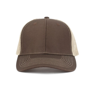 Close-up of brown canvas brim and off-white mesh paneling on a trucker style cap