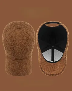 Detail view of brown lamb wool baseball cap with R embroidery and inner mesh lining