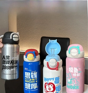 Detail of 500ml stainless steel insulated cups with pop-up lids and cartoon patterns