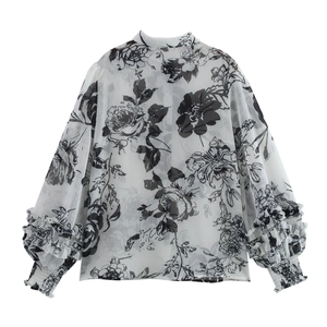 Women's white chiffon long sleeve shirt with black floral print and ruffled layers
