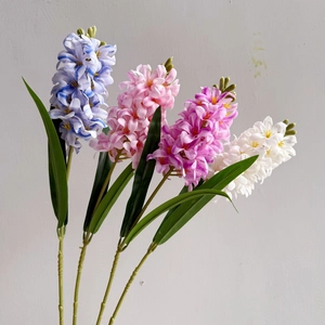Detailed view of artificial hyacinth flowers in blue, pink, purple, and white colors