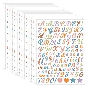Macro view of colorful 0.5-inch alphabet and number sticker sheets for DIY crafts