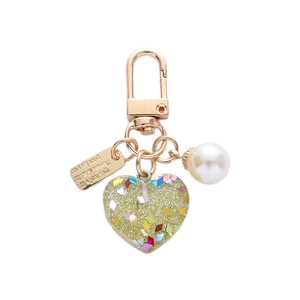 Green resin heart keychain with glitter, white faux pearl and golden metal spring clasp