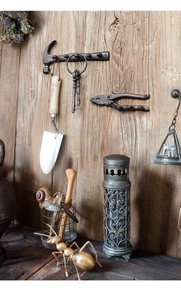 Industrial vintage cast iron wall hooks in hammer and plier shapes for rustic home decor