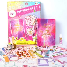 Detailed view of purple star theme DIY journal set including stickers and stationery kit