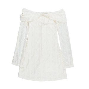 Close-up of white lace texture with bow tie detail on off-shoulder long sleeve dress