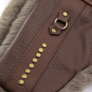 Winter faux leather trapper hat with thick fur lining and vintage metal rivet details
