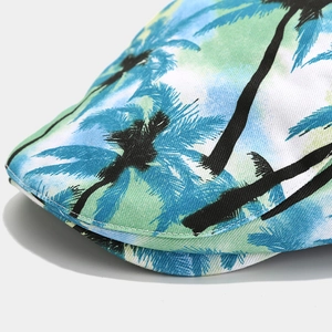 Detail of tropical palm tree print and fine stitching on the vintage short-brim flat cap