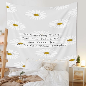 Detail showing Bohemian daisy tapestry with inspirational quotes in bedroom decor