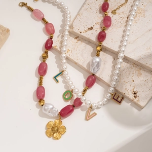 Baroque beaded necklace with pearls, pink stones, floral pendant and LOVE charms