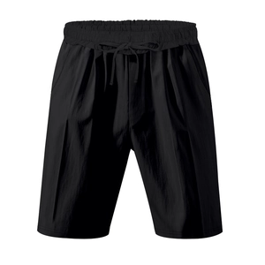 Detail of black summer linen shorts featuring elastic drawstring waistband and side pockets