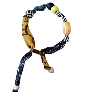Ethnic bohemian necklace featuring fabric printed heart pendant and mixed wooden beads