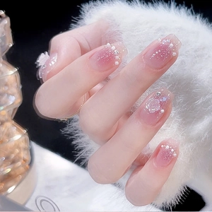 Pink gradient press-on nails with 3D camellia flowers, pearls and glitter accents