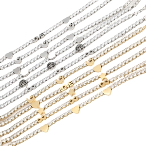 Titanium steel tennis bracelets with crystal charms in gold and silver finishes