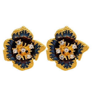 Vintage floral stud earrings with blue enamel and crystal inlays on a gold base