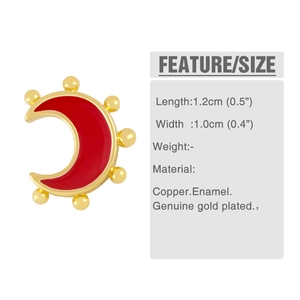 Macro view of moon-shaped red enamel earrings with 18K gold plated brass edges