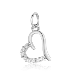 Close-up of heart-shaped copper zircon pendant with silver finish and inlaid gemstones