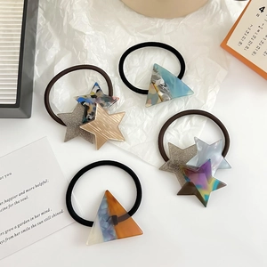 Set of 4 star hair ties with marble pattern and glitter stars for elegant ponytails