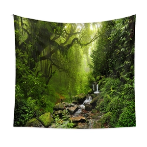 Detailed view of nature tapestry featuring lush green forest waterfall on a white wall