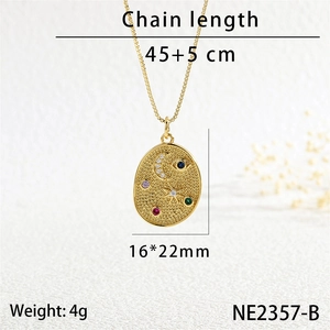 Detail view of gold star moon oval pendant with colorful zircons and size specifications