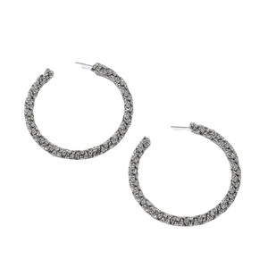 Elegant silver hoop earrings with pavé set crystals on a clean white background