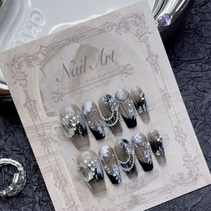 Dark ombre press-on nails with marble texture, rhinestones and silver chain accents