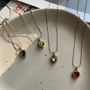 Titanium steel heart pendant necklace set with colorful zircon stones in gold finish