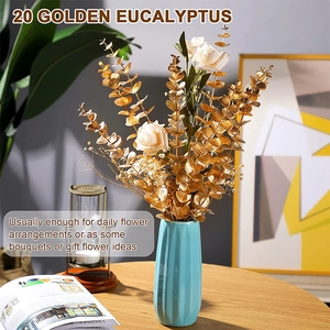 20 pieces of golden artificial eucalyptus leaves set in a blue vase for home decor