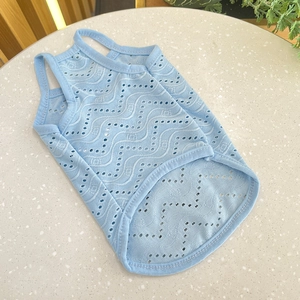 Close-up of light blue wave knit pet vest with breathable hollow-out mesh texture