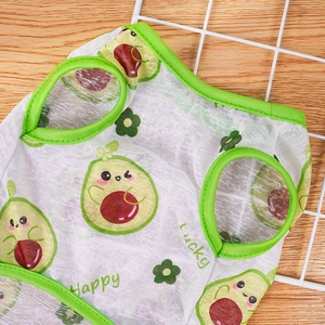 Detail view of breathable white mesh dog vest with green avocado patterns and Lucky text