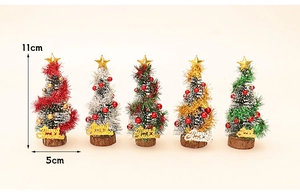 Five 11cm miniature Christmas trees with gold stars and Merry Christmas wood bases