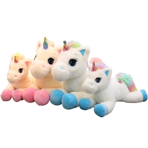 Rainbow plush unicorn dolls in various sizes with colorful horns and manes for children